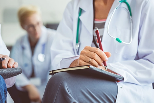 Doctor With A Notepad