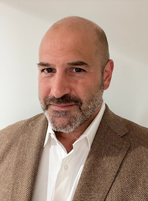 Personal Injury Doctor Louis S. Crivelli Smiling In Sport Coat