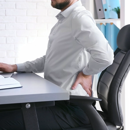 Office Worker With Back Pain