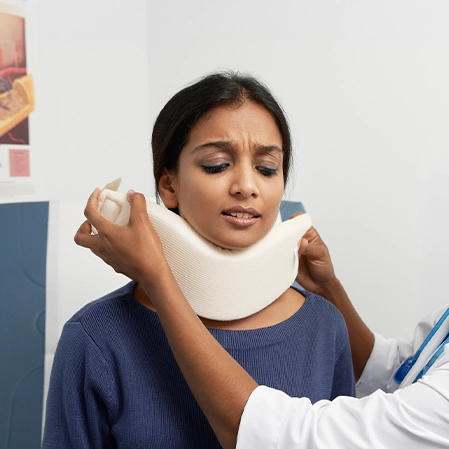 Woman With Whiplash In Pain