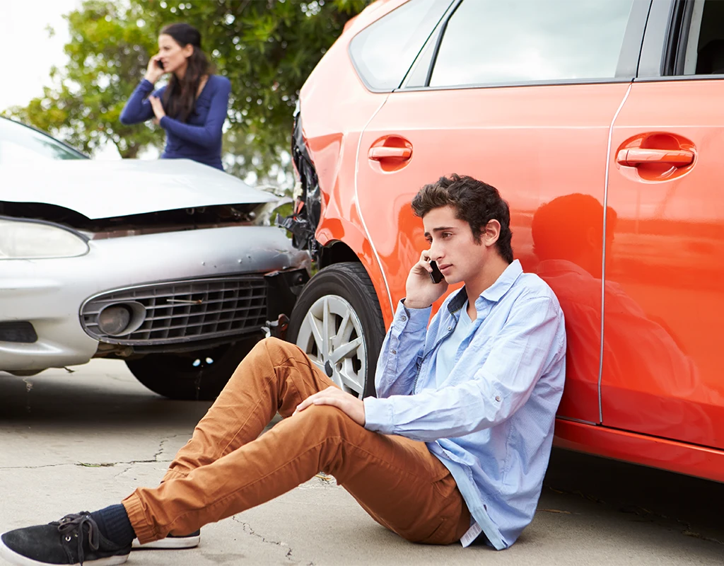 Young Man In Car Accident on The Phone